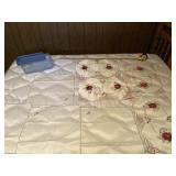 Two sets of four table place mats with floral