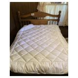 Full size mattress cover with small stain