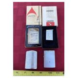 Two Zippo lighters