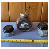 Small solar jars with glass pebbles and taller