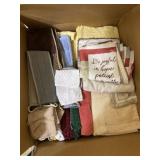 Box full of bathroom towels, wash clothes and