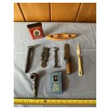 Prince Albert tobacco tin, old pipe, wood canoe,