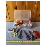 Tote with lid full of scissors, whiteout and