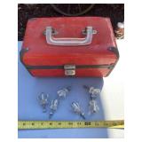 Six cabinet handles and old small luggage piece