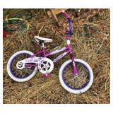 Pink Huffy bicycle