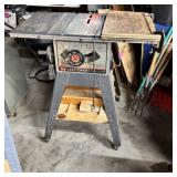 Craftsman 9-inch portable table saw on a stand.