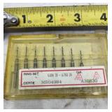 Tulon set of solid carbide micro drill bits.