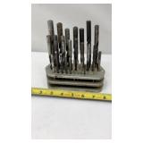 Morse taper shank drill bits held in a metal