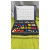 Metal storage case containing an assortment ofw