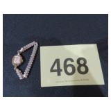 VTG BULOVA SWISS LADIES 10K RGP BREZEL