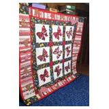 90"X79" machine quilted red Checker Spot