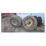 Pair of  21.5L-16.1 tires and rims