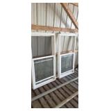 Two Used 28"X58" vinyl replacement windows double