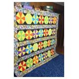 90"X81" machine quilted quilt parasail design