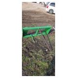Bale spear for John Deere loader.