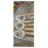 Three porcelain urinals