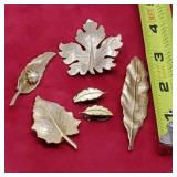 Gold Tone Brooches and clip on earrings