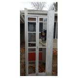 Phone booth w phone, no glass on door and one