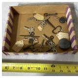 Old keys for clocks and a clock weight