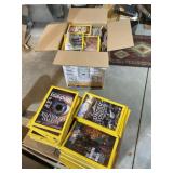 Two boxes full of National Geographic magazines.