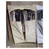 Portable closet with me a shirts size Large and