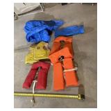Tarp with bag and life jackets