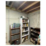 Three wooden book shelves with all books