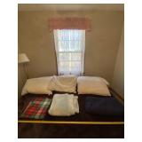 6 pillows and three blankets