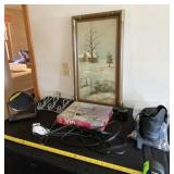 Puzzle, framed print, extension cord , makeup
