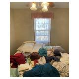 Sheets, pillow cases and pillows, some with