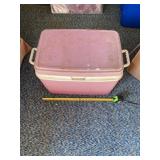 Rubbermaid cooler full of golf balls and some