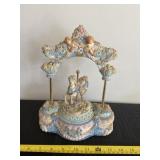 Music box that plays ï¿½Love Makes The Worldï¿½ horse