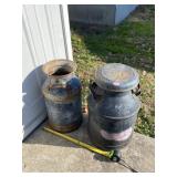 Two milk cans one with lid