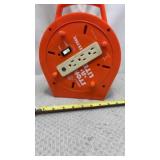 Snapit 2 Stor-A-Lite 25-foot extension cord reel.