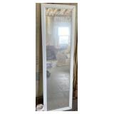 Mirror that needs bottom piece nailed back on