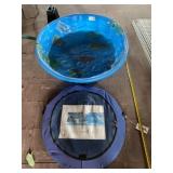 Kids plastic swimming pool and pop up shade tent