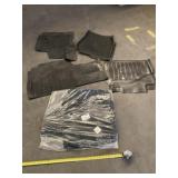Ford mat set with another set unknown if for Ford