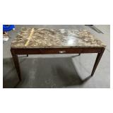 5ft x 32 in x 31 in tall granite table chip in