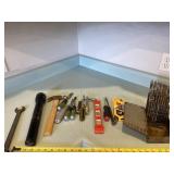Mag Lite, drill bits, level, scrapers, hammer,