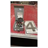 Electrical box and number 4 sign