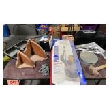 Paint stick , mask, brackets for shelving, maul ,