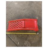 Two drive on car ramps