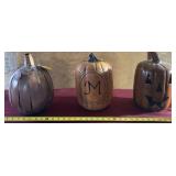 Three pumpkin decorations