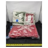 Christmas shrink wrapped rugs, kitchen towels,