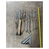 Hammer, pliers,  square, air gauge, extension,