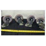 Four heavy duty swivel casters.