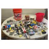 Table full of screws washers nails decking screws