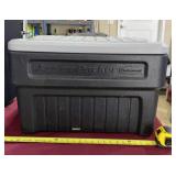 Action Packer Rubbermaid tote with lid.
