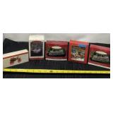 Hallmark collector Christmas ornaments in boxes.
