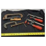 Adjustable C clamps and Bessel bar clamps.